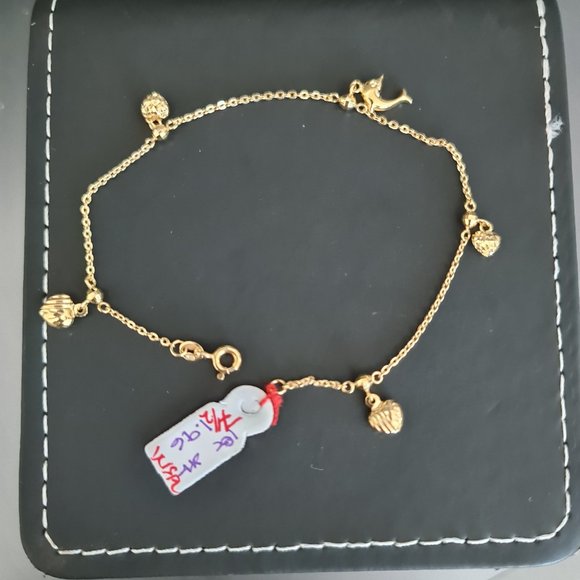 Cute bracelet with cute charms in Real gold